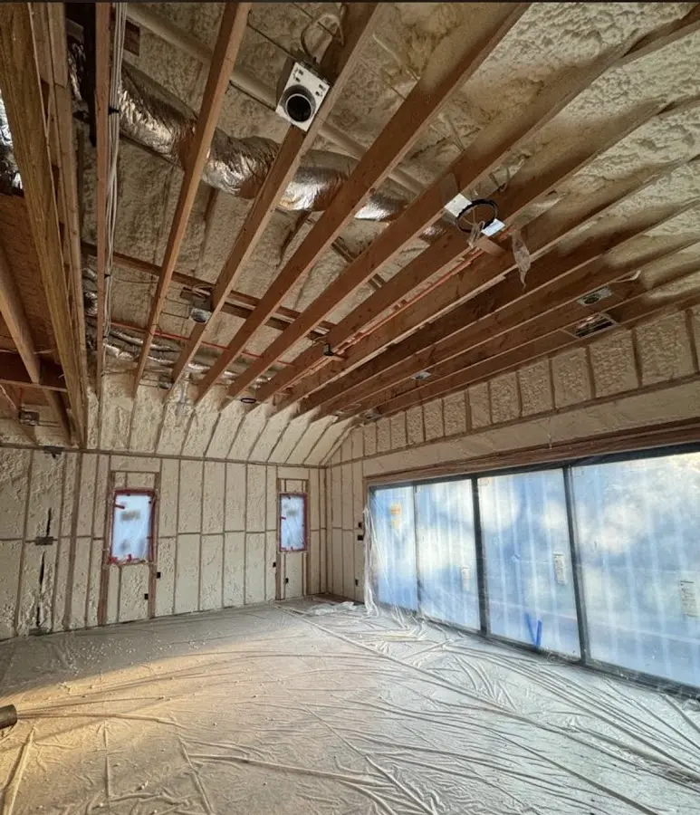 Interior walls and ceiling insulated with spray foam during new construction in New Port Richey